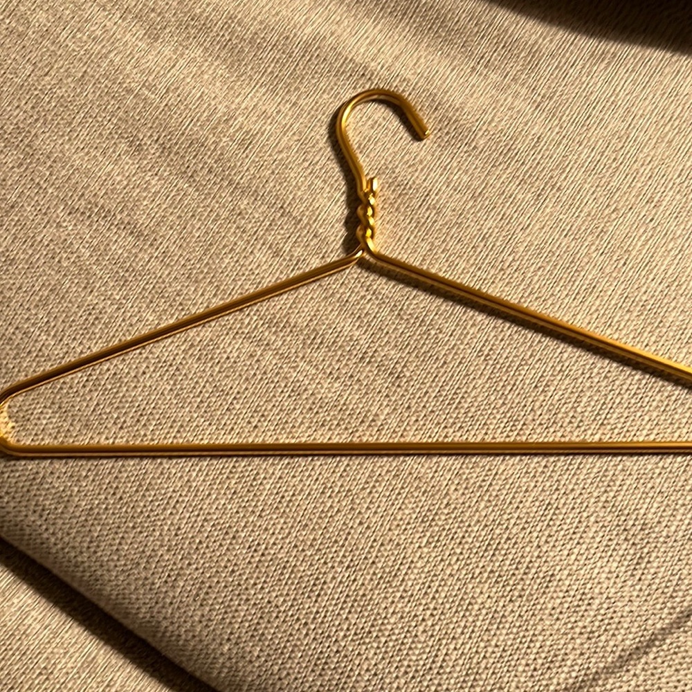 Gold tone hanger